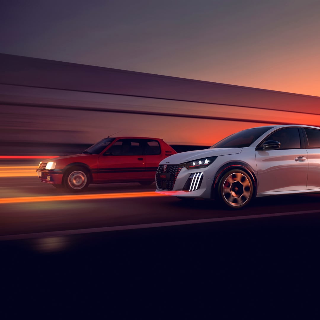 PEUGEOT 205 GTi and PEUGEOT E‑208 GTi driving side by side