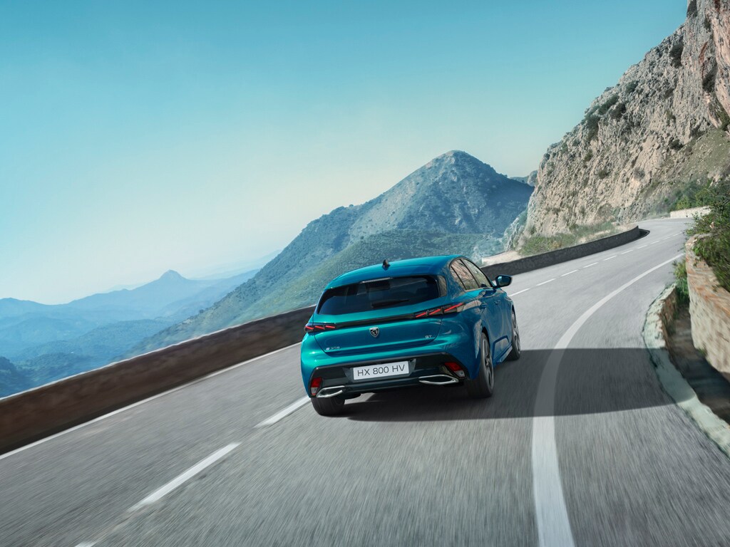 PEUGEOT E-308 rear view on the road