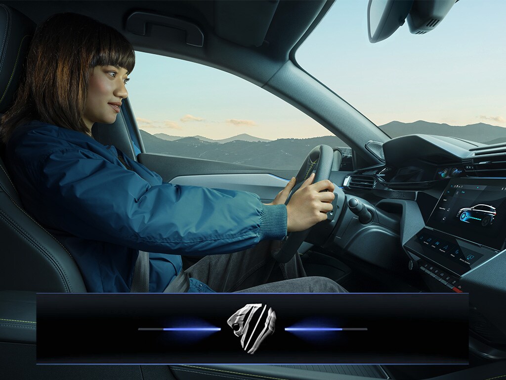 PEUGEOT E-308 i-Cockpit with woman driving