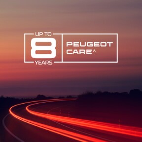 New PEUGEOT E‑208 GTi in a road setting